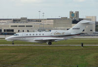 N999QS @ PBI - The business aircraft traffic at West Palm Beach on the Friday before President's Day always provides the aviation enthusiast / photographer with a treat - by Terry Fletcher
