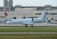 N451CM @ PBI - The business aircraft traffic at West Palm Beach on the Friday before President's Day always provides the aviation enthusiast / photographer with a treat - by Terry Fletcher