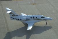 N537RB @ CID - Taxiing below the control tower - by Glenn E. Chatfield