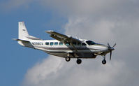 N208CX @ FXE - Cessna Caravan on finals to FXE in Feb 2008