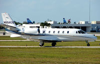 N556CS @ PBI - Citation 560 Excel taxies in at West Palm Beach - by Terry Fletcher