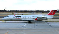 N821AY @ PHL - Northwest CRJ arrives at Philadelphia - by Terry Fletcher