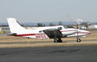 N8156J @ ABE - Check out the chin on that guy.  Just kidding its the light but he sure looks like he has an iron jaw. - by Sam Andrews