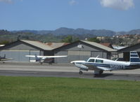 N58079 @ SZP - 1987 Mooney M20J 201LM, Lycoming IO-360 200 Hp, landing roll Rwy 22 - by Doug Robertson