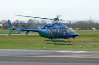 N407WD @ EGBJ - A visitor to Gloucestershire Airport on the day of the horse racing Gold Cup  at the nearby Cheltenham Racecourse - by Terry Fletcher