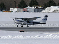 C-GMJF @ CYOW - This Cessna 206 belongs to the Ottawa Police Service.  Notice the FLIR on the left side and the special viewing window for the FLIR operator. - by CdnAvSpotter