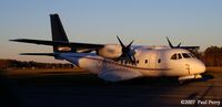 N983BW @ ECG - Striking CASA, especially with that contrasting tail