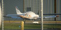 N7623C @ ONX - One fence? No problem.  Heck, I'll shoot through TWO - by Paul Perry