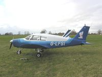 G-LFSI - Cherokee 140 parked out at Bagby