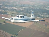 N7883V @ GTU - 1965 Mooney M20C N7883V over Texas - by Lloyd Stearns