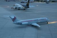 N937AX @ CID - ABX559 taxiing for departure to MLI at about 0650 - by Glenn E. Chatfield