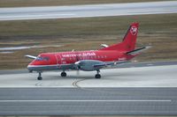 N446XJ @ CID - Taxiing on Alpha crossing Runway 13/31 - by Glenn E. Chatfield