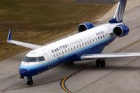 N742SK @ CID - At Alpha 4 below the tower on the way to the gate