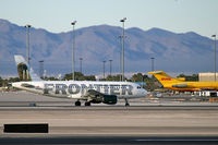 N936FR @ KLAS - Frontier Airlines - 'Earl the Walrus' / 2005 Airbus A319-111 - by Brad Campbell