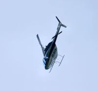 VH-MXW - This copter did a low high speed loop around the hill behind my house. No idea what it was up to. This is the actual attitude he had on as he dove behind the hill, not a rotated pic