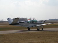 N8428N @ KLVN - Taxiing for a Runway 12 departure. - by Mitch Sando