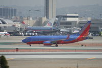 N418WN @ KLAX - Boeing 737-700 - by Mark Pasqualino