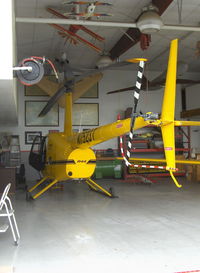 N7523T @ SZP - 2004 Robinson R-44 RAVEN II, Lycoming IO-540 derated to 245 Hp for 5 minutes, 205 Hp continuous, in hangar - by Doug Robertson