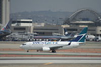 C-FZWS @ KLAX - Boeing 737-700 - by Mark Pasqualino