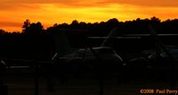 N103CW @ ISO - Colorful sunset beyond this twin
