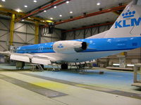 PH-OFG @ EHAM - New livery for PH-OFG! It's always nice to see an aircraft come in with old paint and go out with shiny new paint! Inside the QAPS paintshop at Schiphol. - by Remon Pouw
