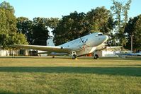 N40386 @ OSH - Taken during Oshkosh AirVenture 2002.  This is proof that the DC-3/C-47 series can be born again. This particular aircraft was converted from a C-47 to a turbo-prop fire tanker by Basler Turbo Conversions in Oshkosh, WI. - by Bradley Bormuth