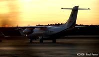 N406FJ @ ISO - Framed with the lovely sunset