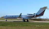 N529QS @ EGGW - Netjets G550 at Luton - by Terry Fletcher