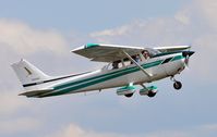 N3065E @ 5W8 - Departing runway 22 - by John w. Thomas