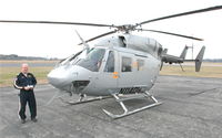N1140H @ DAN - Mbb BK  117 A-3 w/pilot after fefueling at Danville Regional Airport. - by Richard T Davis