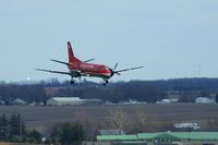 N411XJ @ CID - On approach to Runway 27 - by Glenn E. Chatfield