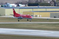 N411XJ @ CID - About to cross over the numbers landing Runway 27 - by Glenn E. Chatfield