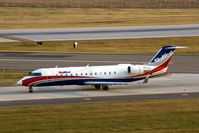N947SW @ CID - Taxiing in on Alpha after landing Runway 27, late afternoon
