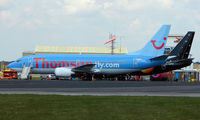 G-THOL @ EGHH - Thomson B737 awaits its next turn at Bournemouth - by Terry Fletcher