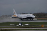 G-OZBB @ EGCC - Taken at Manchester Airport on a typical showery April day - by Steve Staunton