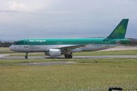 EI-DEN @ EGCC - Taken at Manchester Airport on a typical showery April day - by Steve Staunton