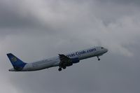 G-OMYJ @ EGCC - Taken at Manchester Airport on a typical showery April day - by Steve Staunton