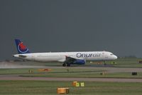 TC-OAF @ EGCC - Taken at Manchester Airport on a typical showery April day - by Steve Staunton