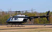 N309HP @ 5W8 - Lifting off - by John W. Thomas