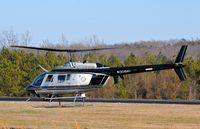 N306HP @ 5W8 - Lifting off - by John W. Thomas