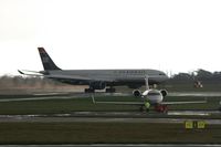 N278AY @ EGCC - Taken at Manchester Airport on a typical showery April day - by Steve Staunton