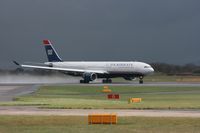N278AY @ EGCC - Taken at Manchester Airport on a typical showery April day - by Steve Staunton