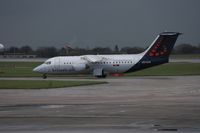 OO-DJN @ EGCC - Taken at Manchester Airport on a typical showery April day - by Steve Staunton