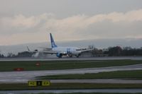G-XLAK @ EGCC - Taken at Manchester Airport on a typical showery April day - by Steve Staunton