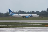 G-XLAK @ EGCC - Taken at Manchester Airport on a typical showery April day - by Steve Staunton