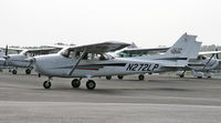 N272LP @ CDW - Nice, new Skyhawk negotiates the crowded ramp at CDW. - by Daniel L. Berek
