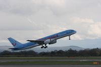 G-BYAY @ EGCC - Taken at Manchester Airport on a typical showery April day - by Steve Staunton
