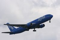 C-GZUM @ EGCC - Taken at Manchester Airport on a typical showery April day - by Steve Staunton
