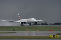 A6-EBV @ EGCC - Taken at Manchester Airport on a typical showery April day - by Steve Staunton