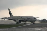 AP-BGZ @ EGCC - Taken at Manchester Airport on a typical showery April day - by Steve Staunton